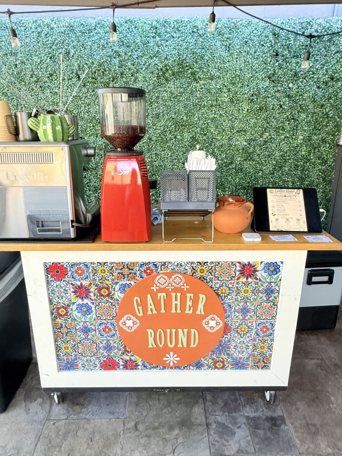 Colorful Gather Round Coffee cart with espresso equipment
